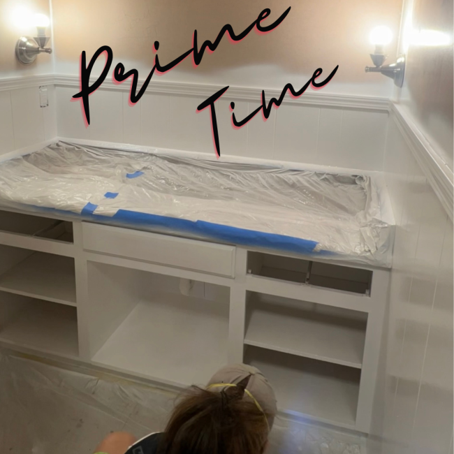 bathroom remodel part 2- priming bathroom cabinets and walls