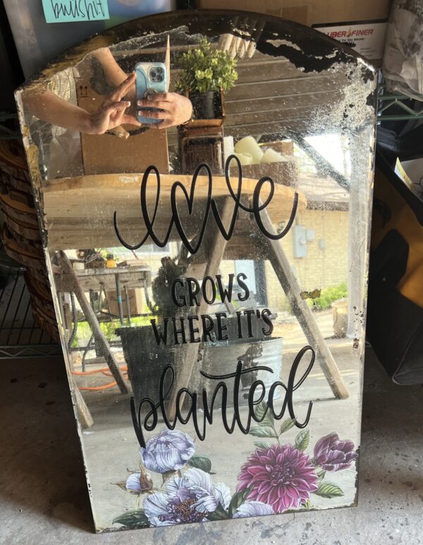 “Love Grows Where It's Planted" mirror